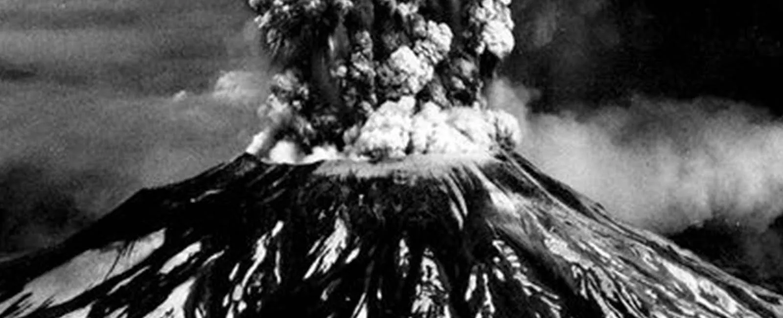 Mount St. Helens erupting, an ash plume rising over the crater